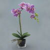 Umelá kvetina orchidej v kvetináči fialová